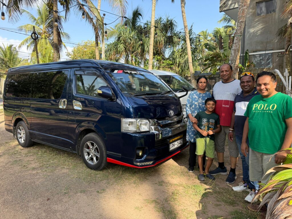 Tour guide and group of tourists traveling in a comfortable van during a Sri Lanka sightseeing tour
